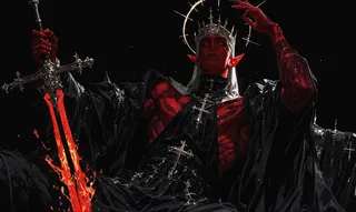 Muscular red-skinned male warrior with red eyes, wearing a black cloak adorned with silver crosses, a crown with a glowing halo, holding a flaming sword against a black background.